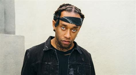 ty dolla sign sunglasses|ty dolla yellow socks.